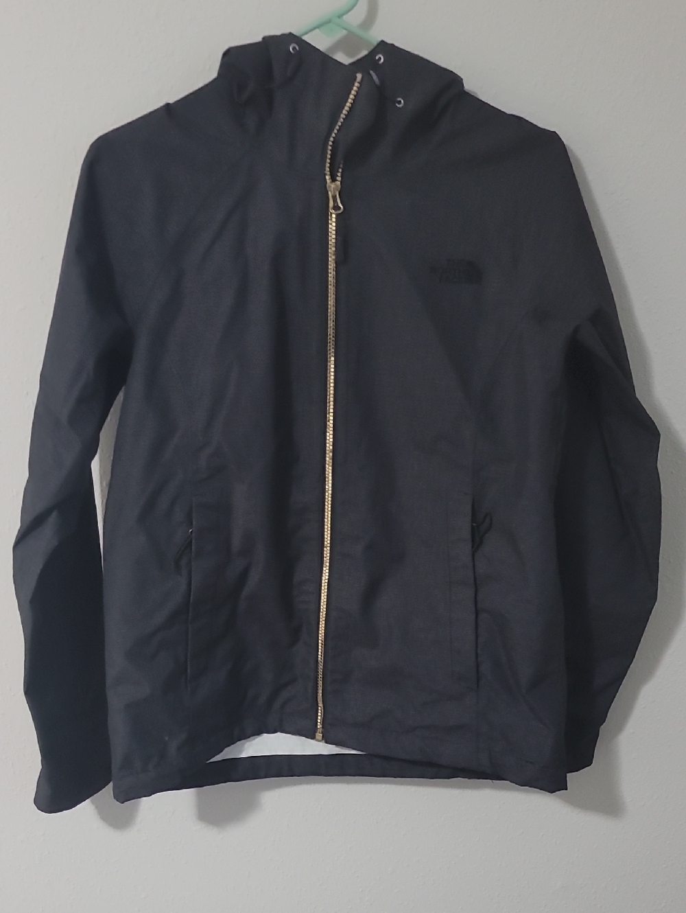 The North Face Black Hooded Rain Jacket with Gold Zipper